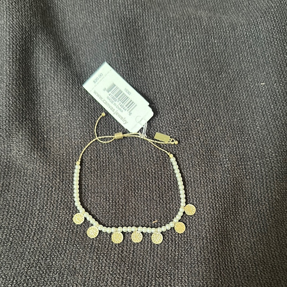 Elegant Gold and White Beaded Bracelet